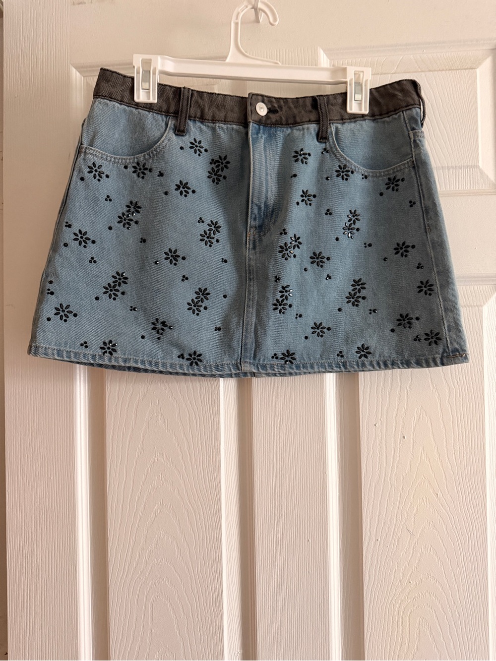 H&M Light Blue Denim Mini Skirt with Black Floral Rhinestone.